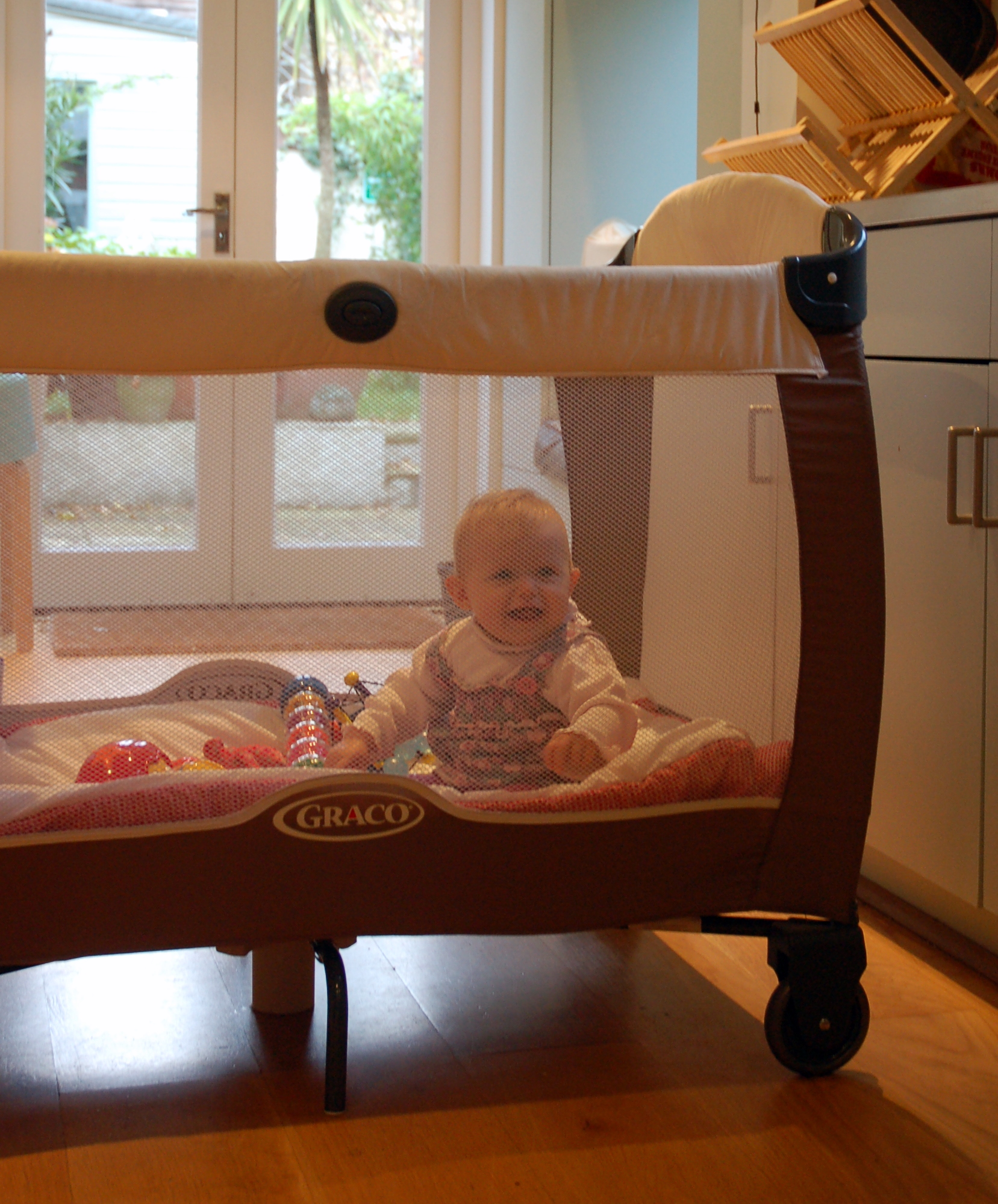 Travel cot sales as permanent bed